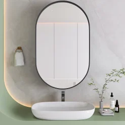 Armoire à miroir ovale noire avec cadre métal, meuble mural avec étagères réglables, rangement salle de bain
