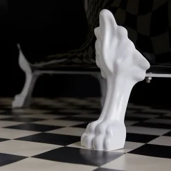 Baignoire ilot Charly ovale noire et blanche avec piétements blanc