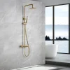 Colonne de douche thermostatique or brosse acier et laiton PVD avec flexible et douchette