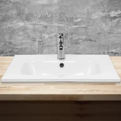 Lavabo en céramique blanc avec garniture de vidage et trop-plein 610x165x460 mm