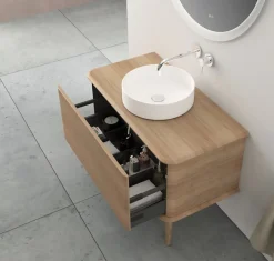 Meuble sous-vasque à suspendre l.95 cm avec plan de toilette, vasque à poser et pieds H.29 cm, effet chêne tabac, Idra