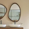 Miroir organique en mindi massif finition noyer 60x90 cm