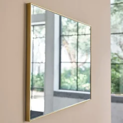 Miroir rectangulaire en métal doré
