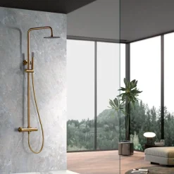 Set douche thermostatique or acier et laiton PVD avec douchette extensible anticalcaire